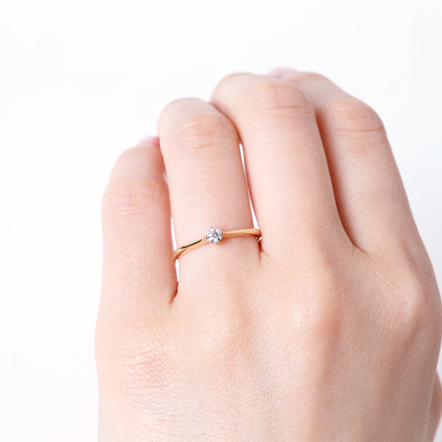 K18/Pt「中石0.1ct リロ」エンゲージリング