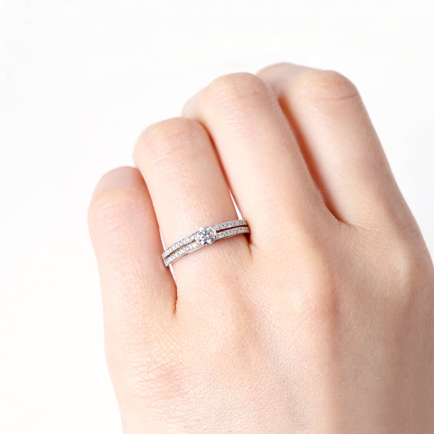 K18/Pt「中石0.2ct ベル」エンゲージリング