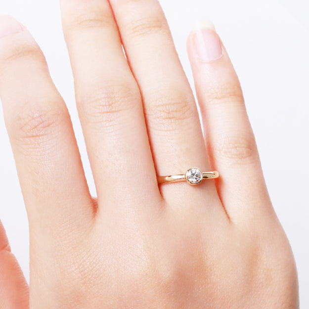 K18/Pt「中石0.2ct カロン」エンゲージリング